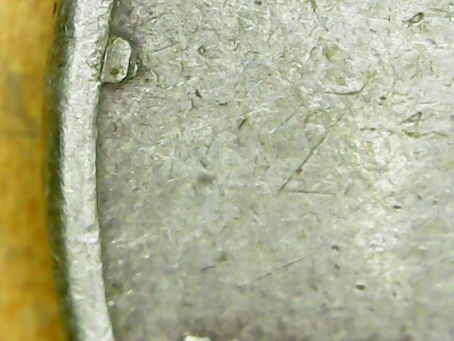 Does-The-Die-Chip-On-This-1958-D-Quarter-Give-It-Any-More-Value?